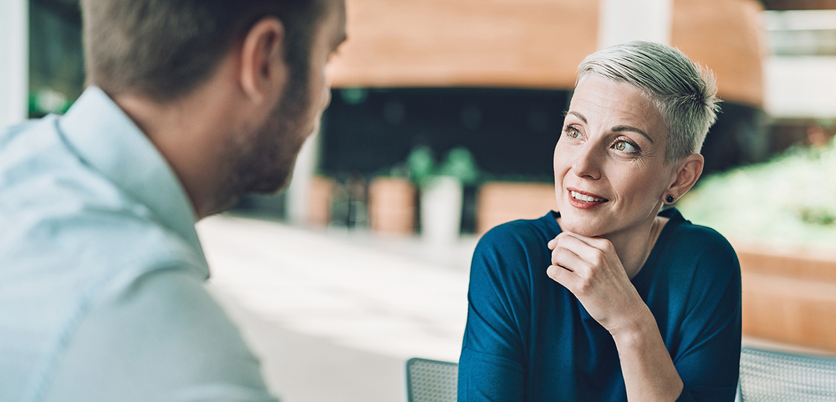 Two employees chatting